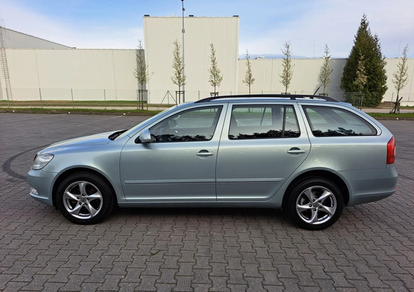 Skoda Octavia cena 24800 przebieg: 153000, rok produkcji 2009 z Pabianice małe 352